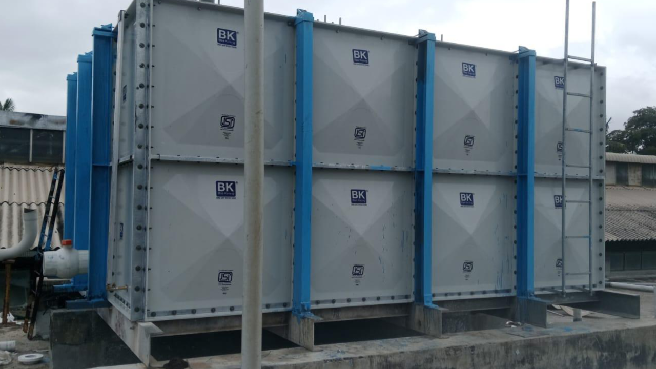 Large BK SMC GRP Tank Rooftop Installation with Blue Structural Pillars